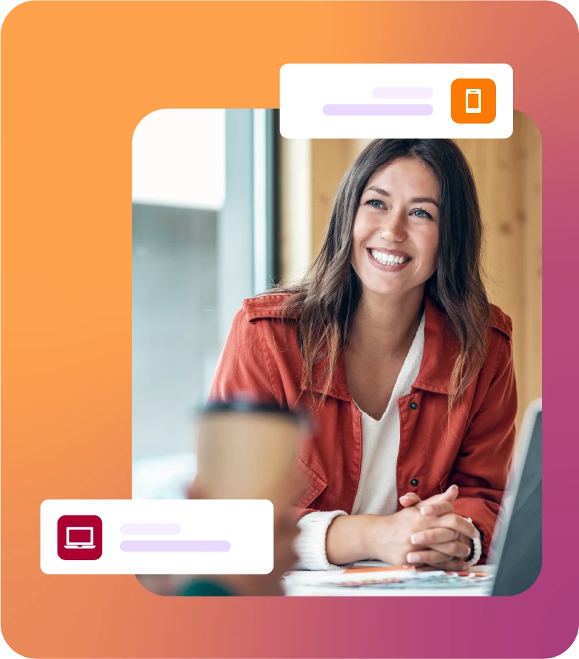 Lady smiling during a meeting with laptop on the table