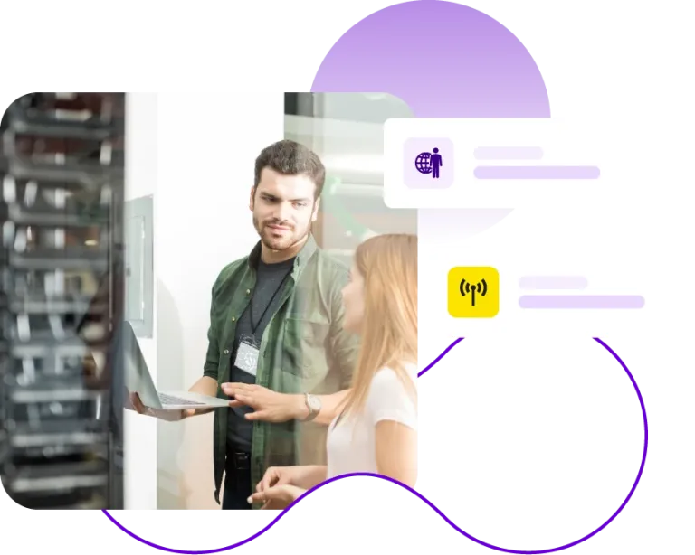 Lady and man in server room having a discussion
